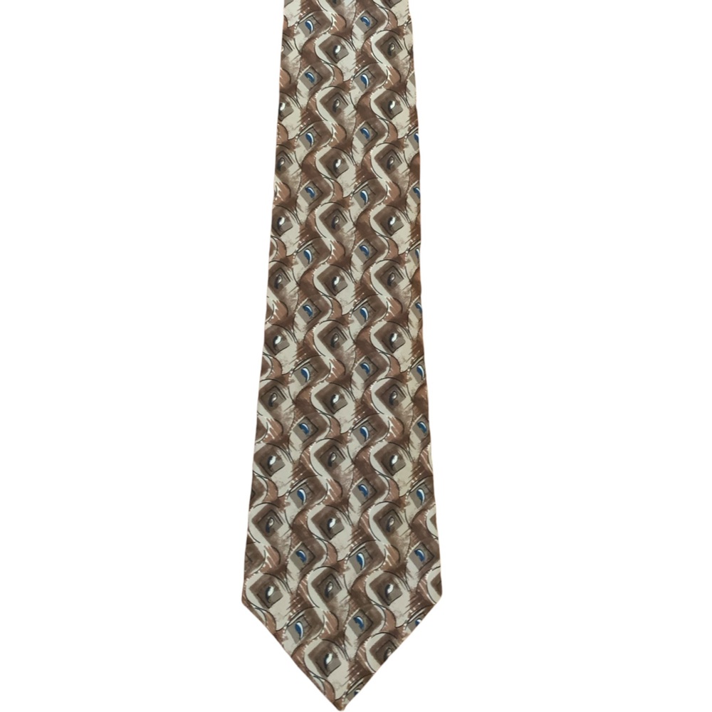 J T Beckett 100% silk tie. Tan, cream and blue print.  Like new. No spots.